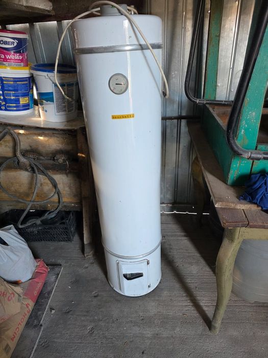 Boiler pe curent si lemne de vânzare  detali în privat