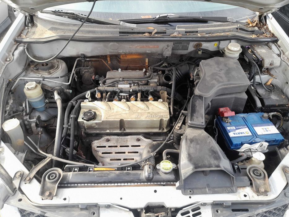 На части! Mitsubishi Outlander 2.4 i 16V 4WD