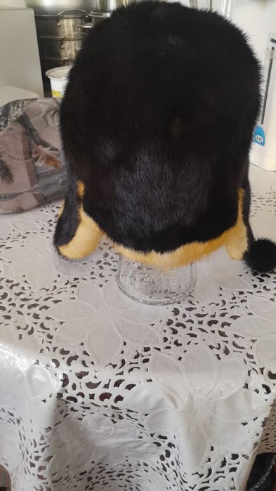 Продам норкувую шапку б/у