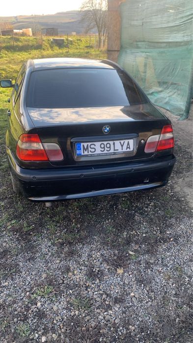 BMW SERIA 3/E56  cu trapa