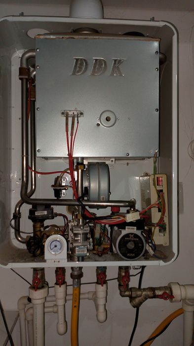 Ремонт газовых котлов. Установка газовых котлов. Газовый котел Жондеу