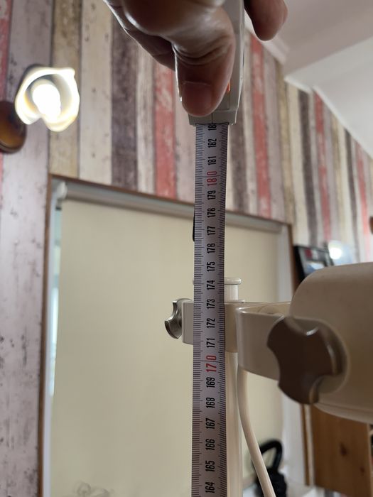 white IKEA Hektar floor lamp with 3-spotlights.