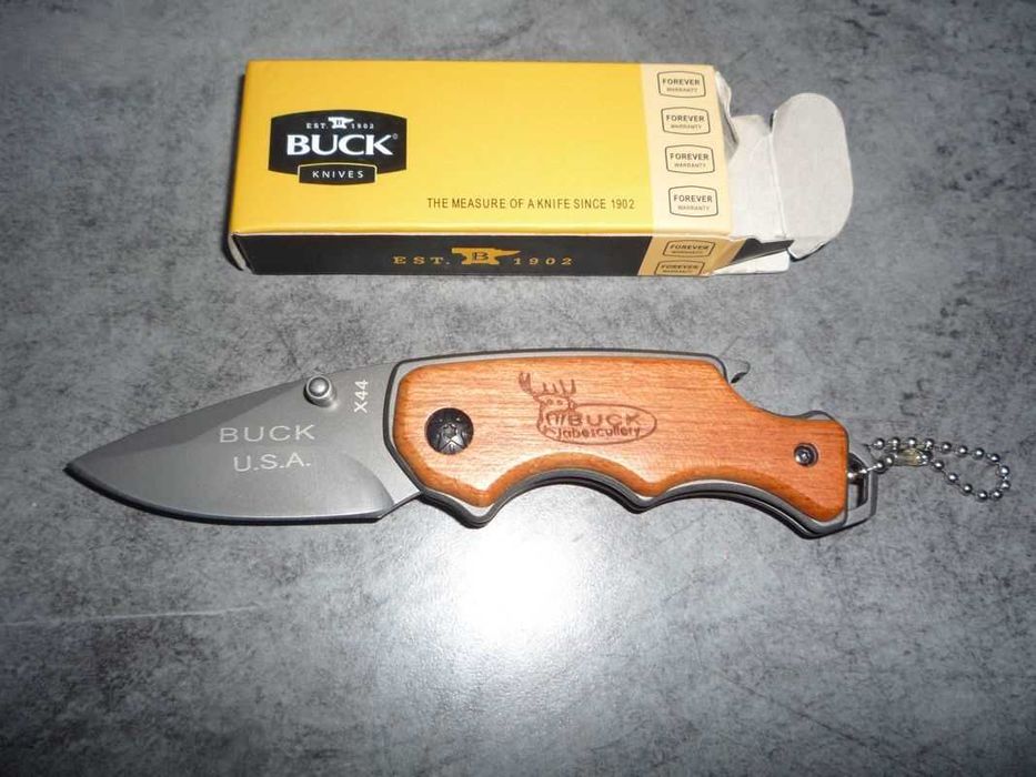 Briceag USA Buck x44, multifunctional, Maner lemn, desfacator bere etc