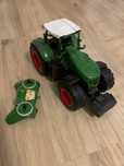 Tractor de jucarie cu telecomnada