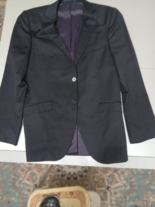 Костюмы новые 48р