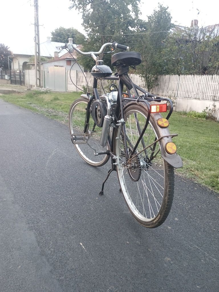 Bicicleta cu motor nou in  4 timpi
