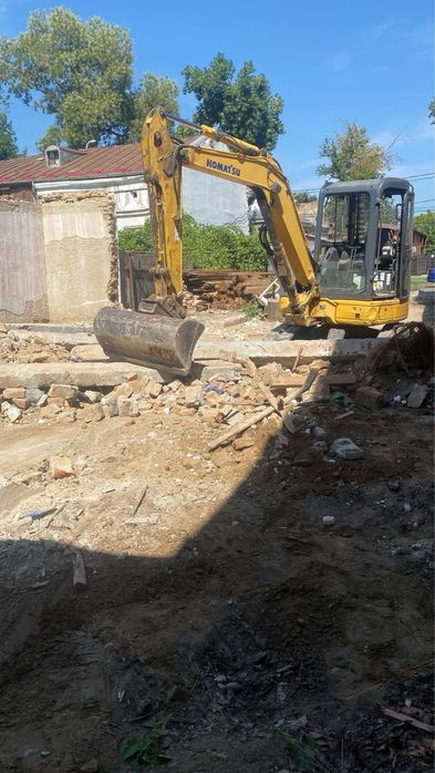 Transport -MOLOZ-CONTAINERE-DEMOLARI -pamant-incarcari moluz bobcat.