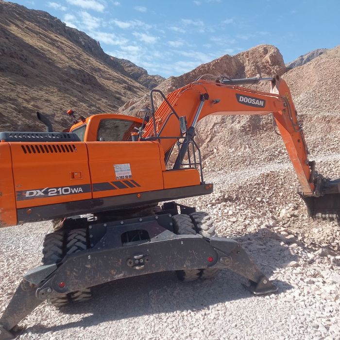 Ekskavator Doosan DX 210 WA kalyosniy