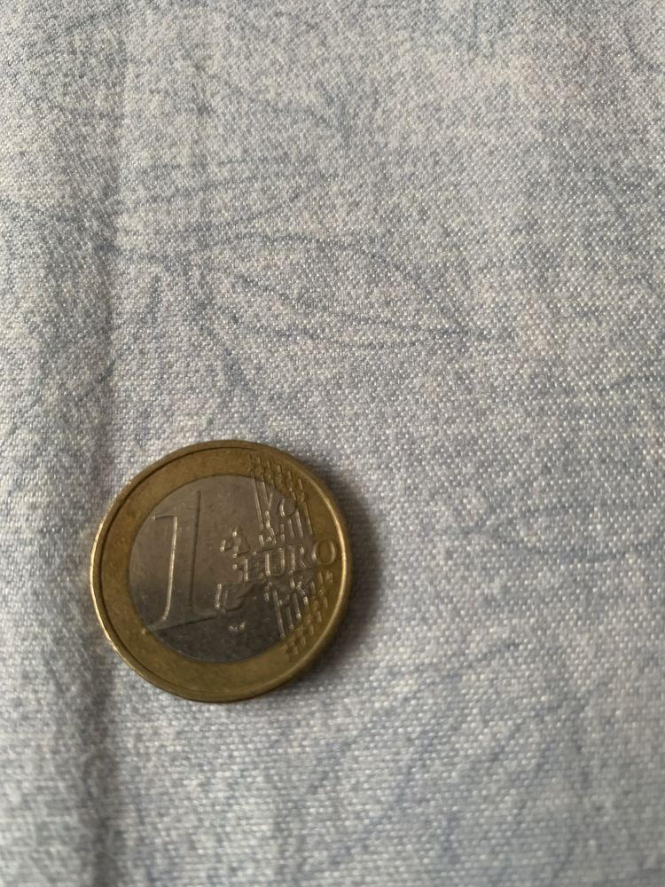 Vand moneda de un euro din anu 2002 adusa din grecia