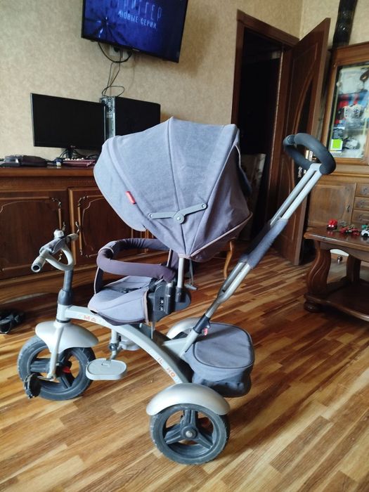 Детская вело коляска с поворотом сиденья.цена 350 тыс.