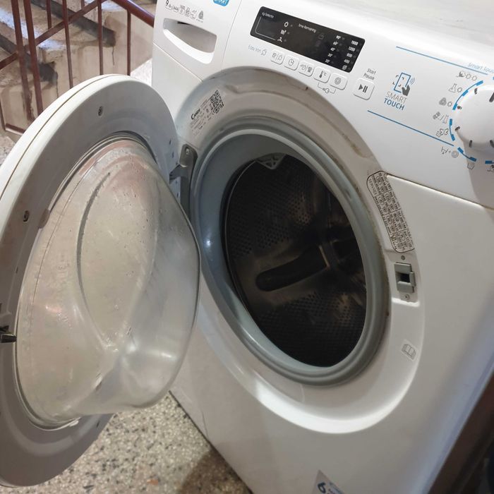 Пералня със сушилня  CANDY на 5 години.