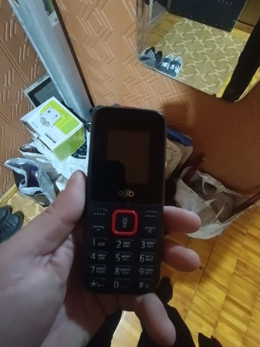 Ajib сотовый телефон