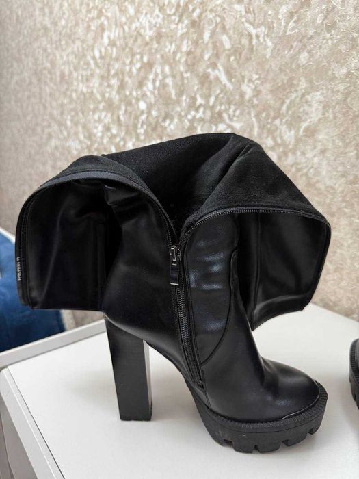 Продаются высокие сапоги, утепленные в отличном состоянии