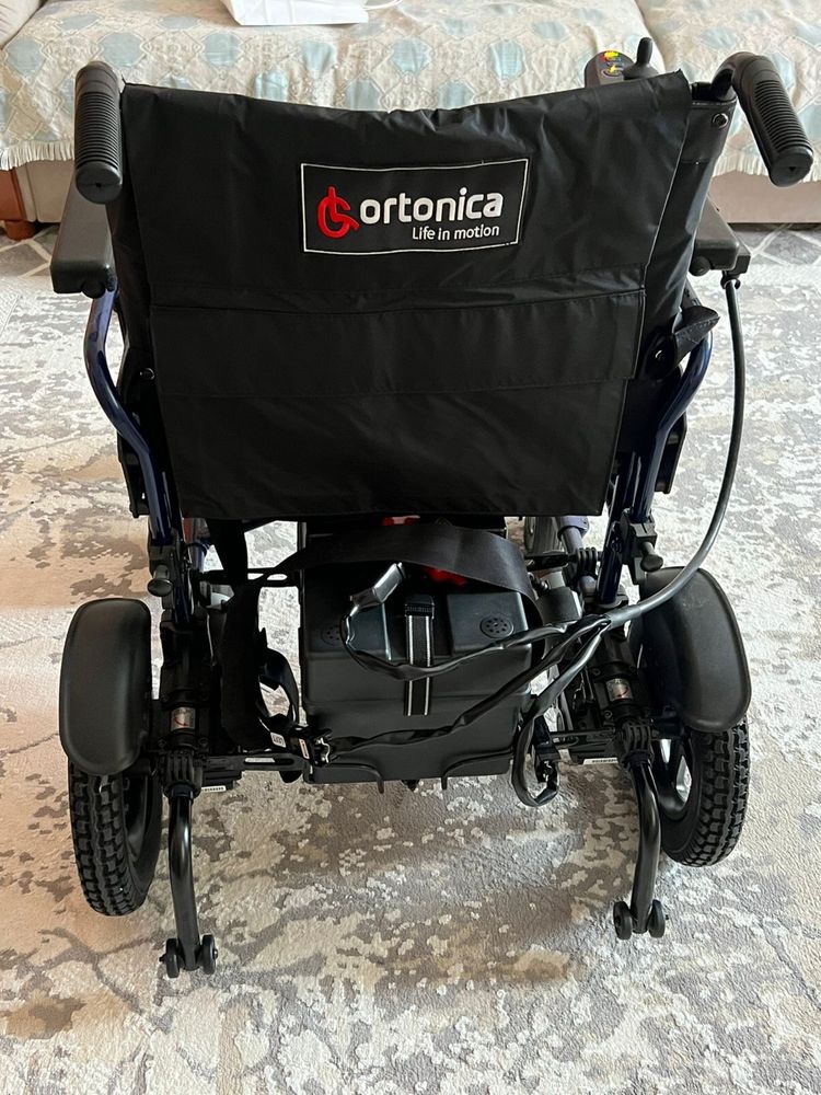Электрическая инвалидная коляска