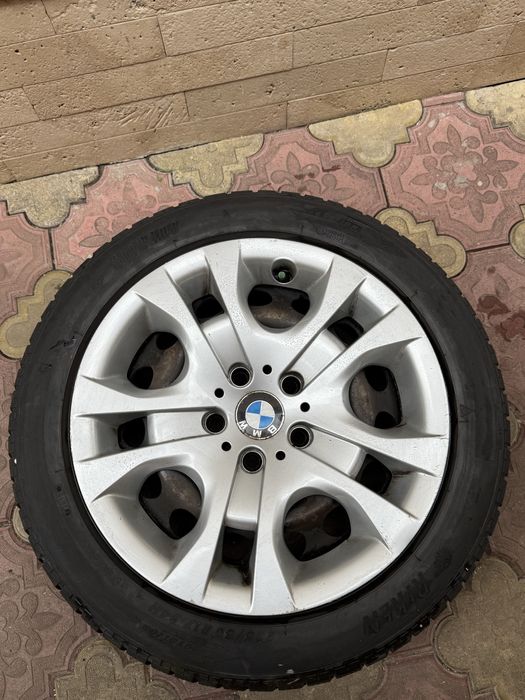 Jante tablă BMW X1 R17 cu capace + cauciucuri 225/50 R17