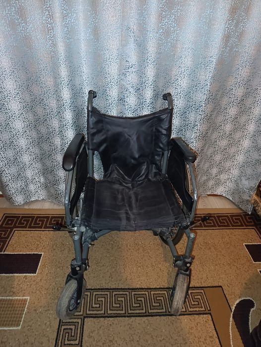 Инвалидная коляска