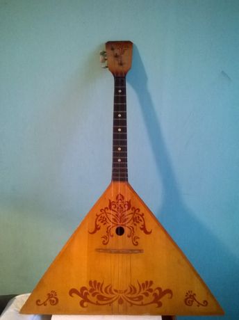 Балалайка - музыкальный инструмент