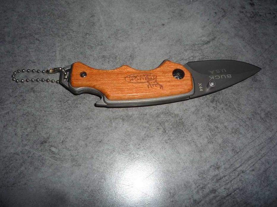 Briceag USA Buck x44, multifunctional, Maner lemn, desfacator bere etc