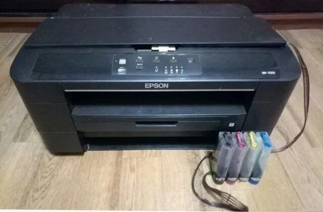 Epson wf 7015 ошибка выходит