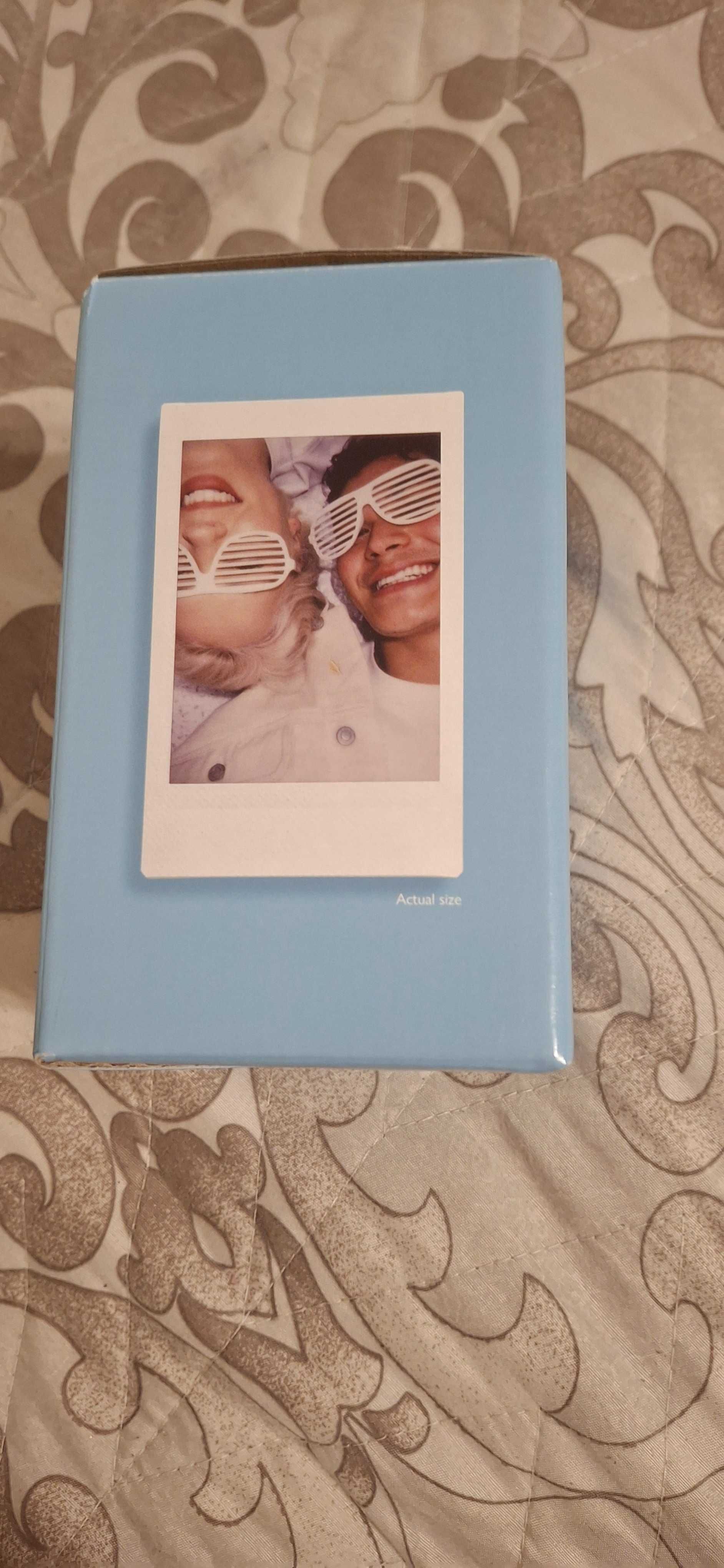 Instax mini 12,апарат за моментални снимки.