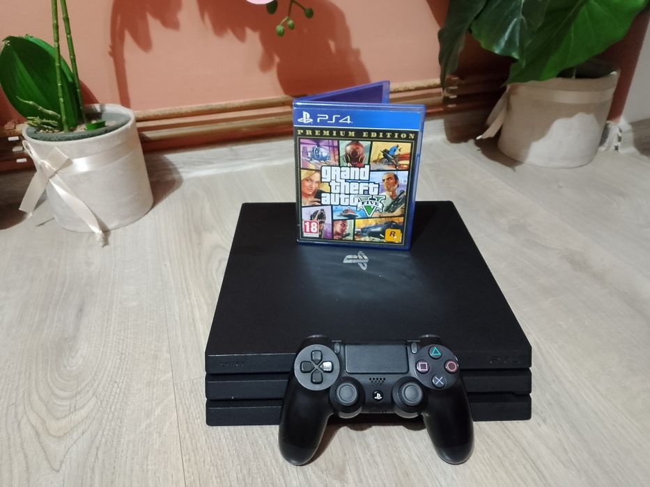 Playstation 4 + 20 jocuri, 1TB, 4K
