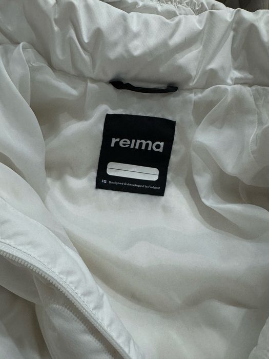 Продам зимний пуховик reima