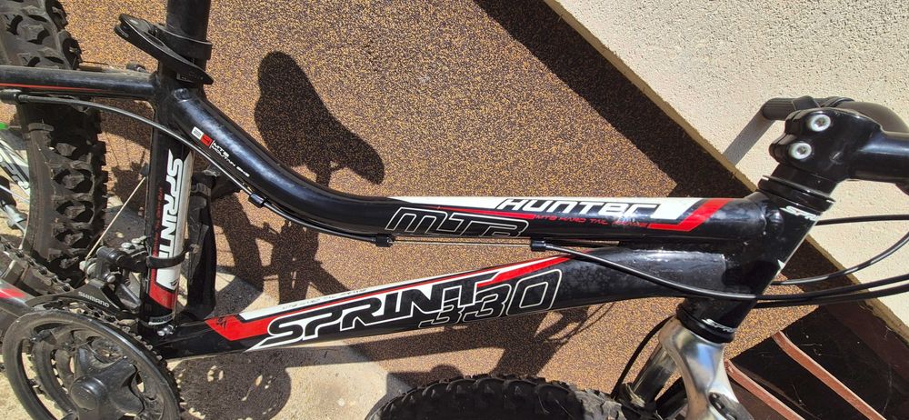 Bicicleta MTB Sprint 21 viteze, frane disc, roti 24''