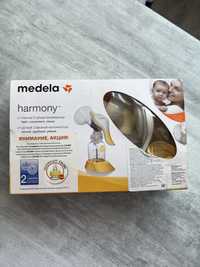 Молокоотсос Medela