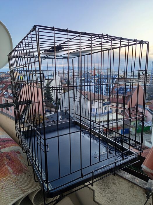 Продавам клетка за кучита