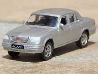 Macheta GAZ Volga 31105 2004 Rusia Welly argintie sc 1:60 cu cutie