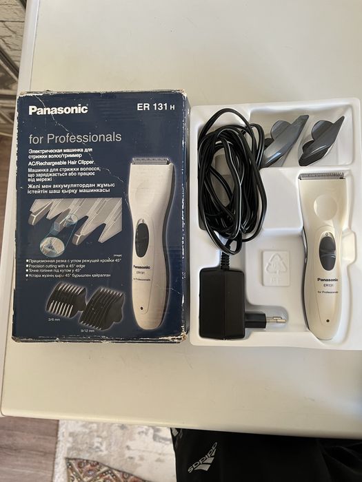 Машинка для стрижки волос и триммер Panasonic.