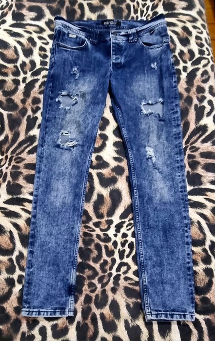 Джинсы рваные  Kenzo.