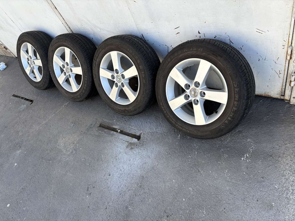 4бр. Алуминиеви джанти с гуми 195/65 R15цола от Mazda  5x114.3