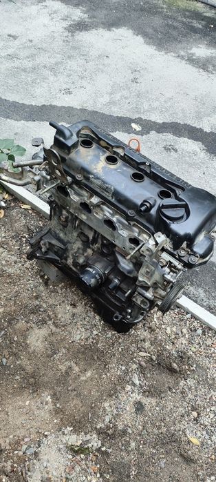 Двигатель QG15DE