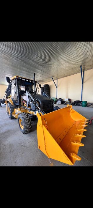 Услуги экскаватора погрузчика