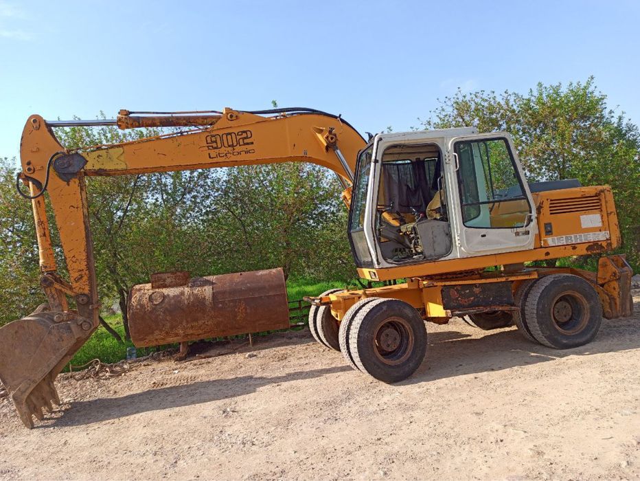 Lipher 902 ekskavator sariq