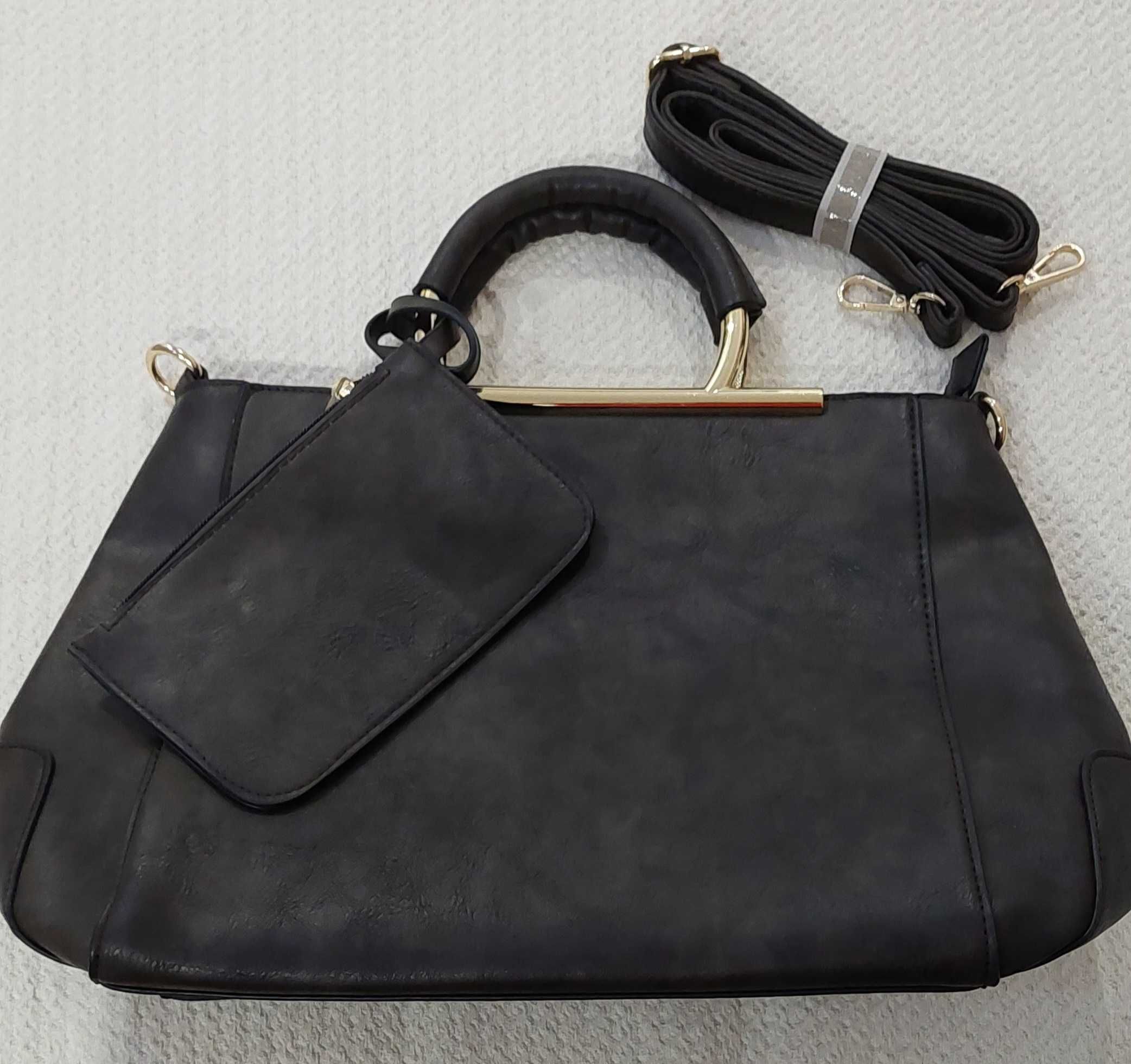 Дамска чанта ,нова ! Модела е един в два цвята ,черна и тъмно кафява !