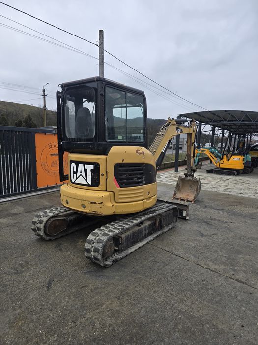 Vand miniexcavator Caterpillar 303 3200 kg