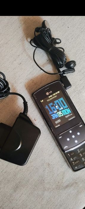 LG KF510 + accesorii originale LG ( decodat,lb română)