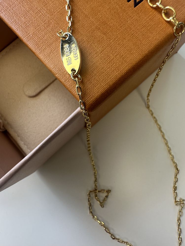 colier louis vuitton auriu