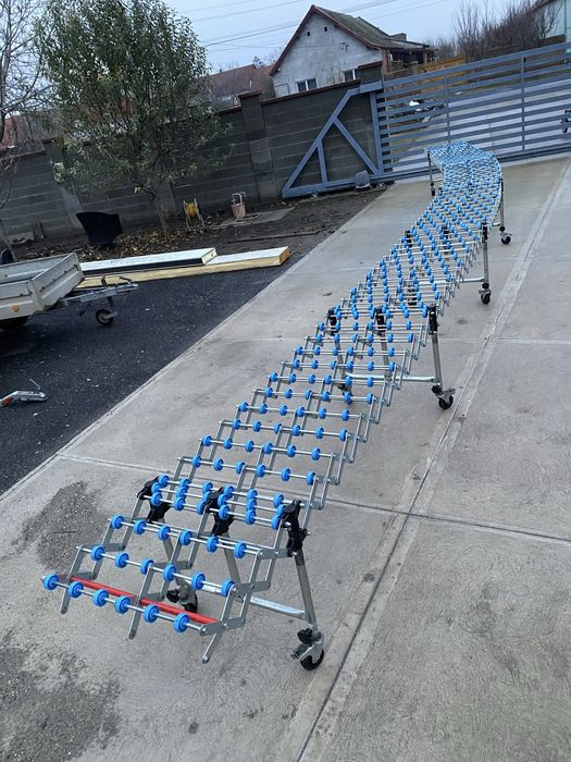 Banda transportoare , cale cu role mici flexibila Gura