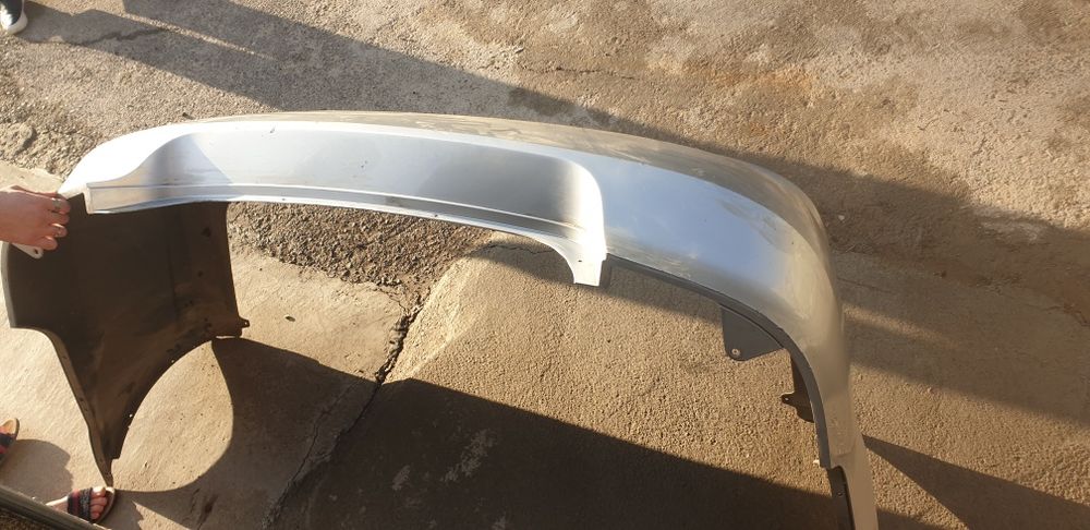 Продам оригинальный задныйбампер от нексия 3 стального цвета