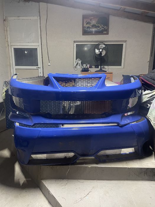 Продам бампера перед зад от карисмы