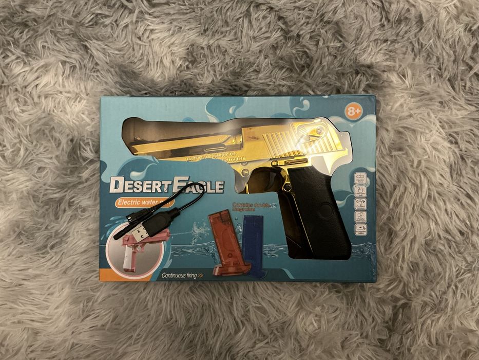 Врляной пистолет золотой