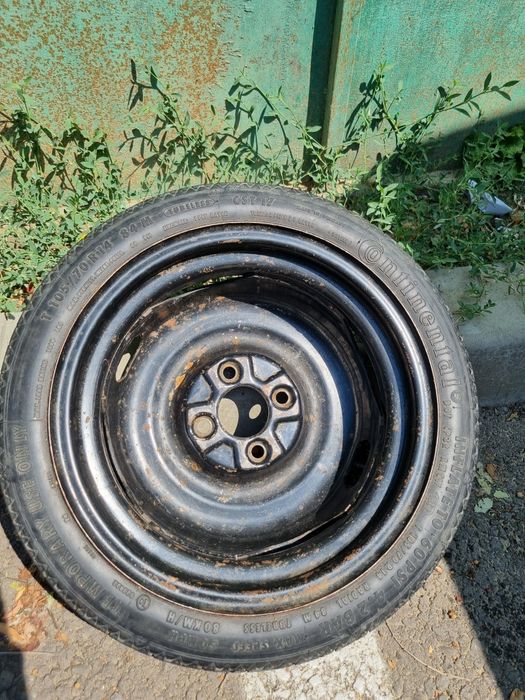 Roata  rezerva slim logan .