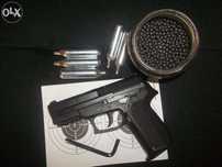 Pistol airsoft GREU (cu Aer Comprimat) Model COLT + Butelii si BileCO2