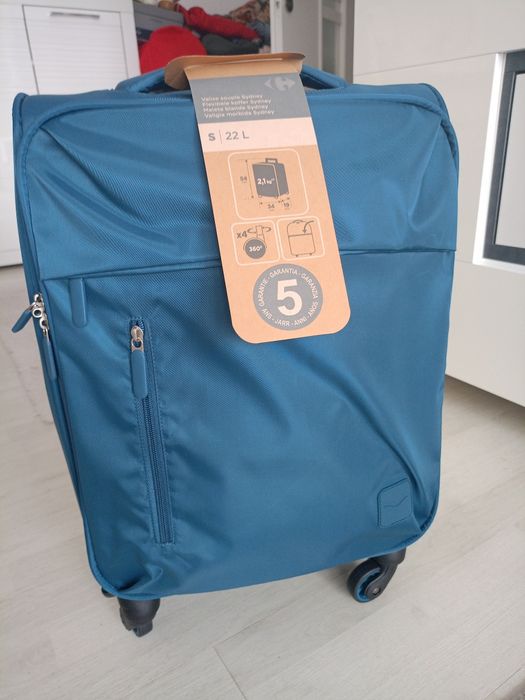 Vând troler material textil dimensiune de 54 cm nou nouț, produs de ca