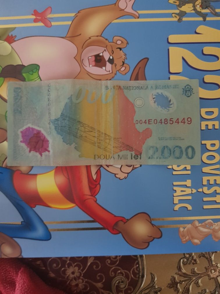 Bancnotă 2000 de lei anul 1999 seria 004E *NEGOCIABIL*