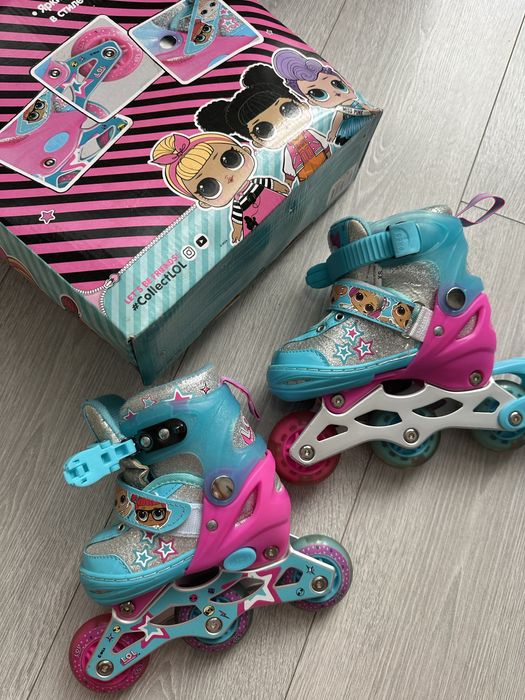 Роликовые коньки новые