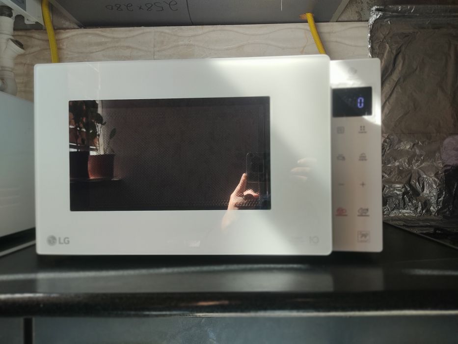 Mikravalnovka  LG  smart inverter yangi ishlatilmagan